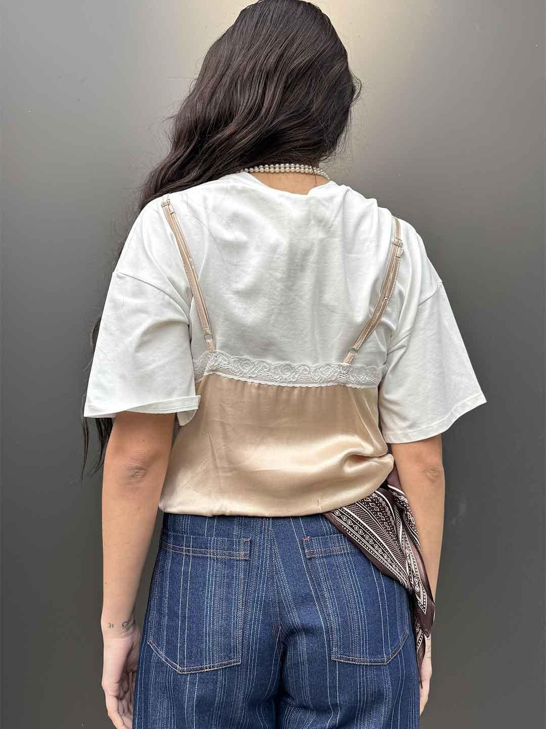 Tensione In t-shirt rosa con top