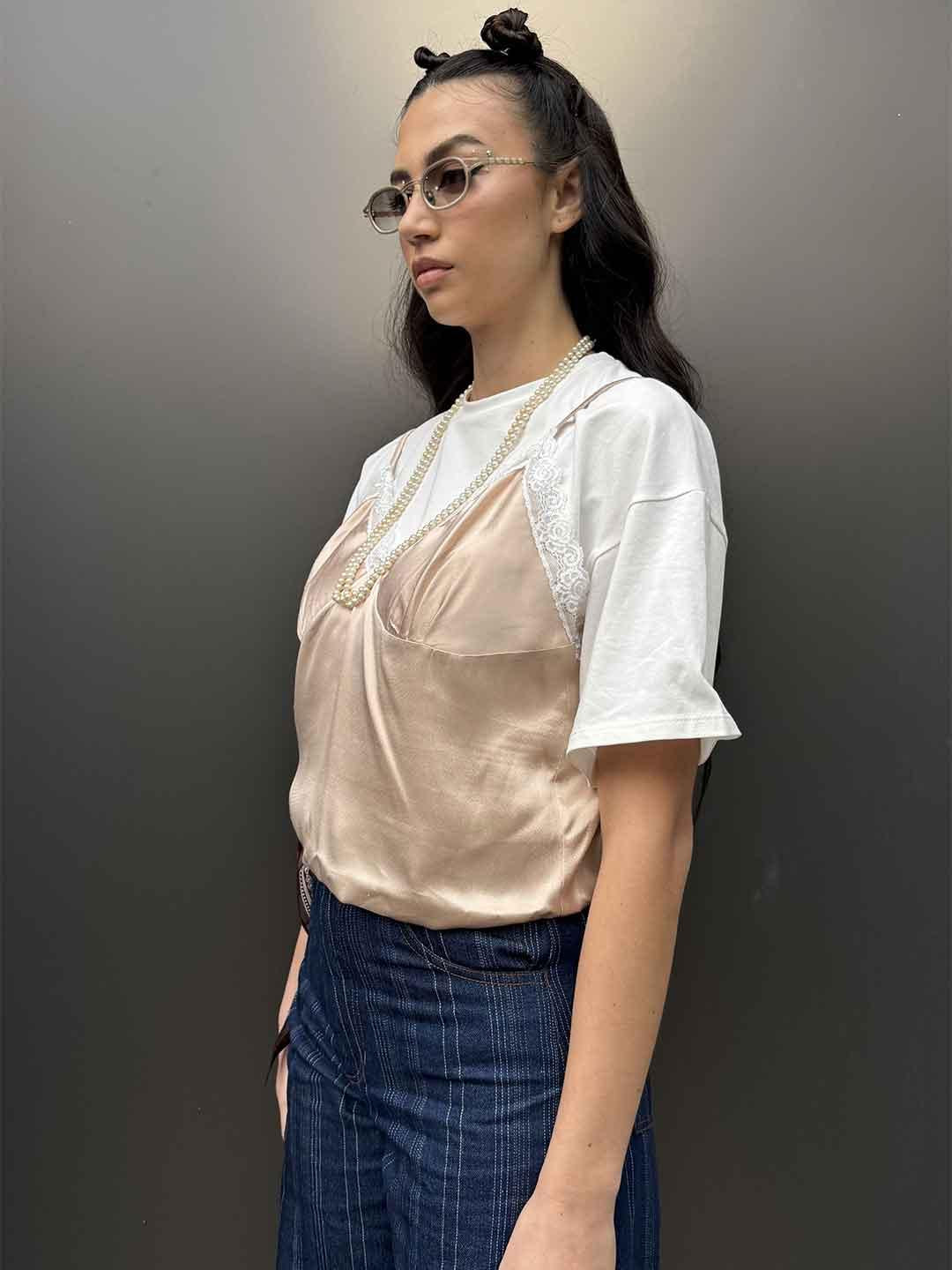 Tensione In t-shirt rosa con top